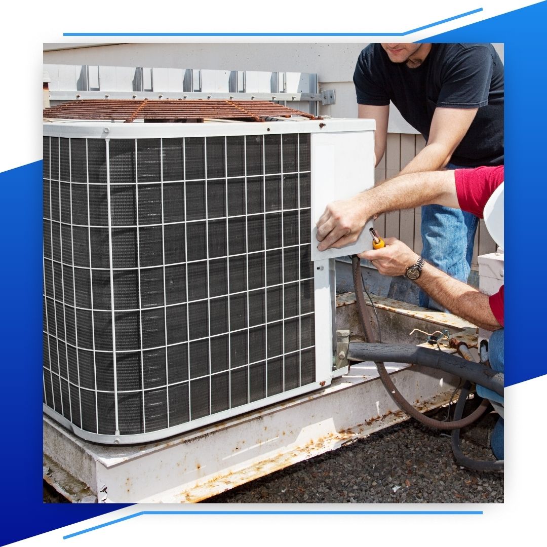 Man repairing an AC unit