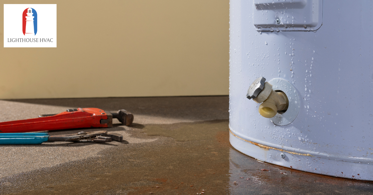 leaky water heater next to tools Lighthouse HVAC leaky water heater next to tools Lighthouse HVAC